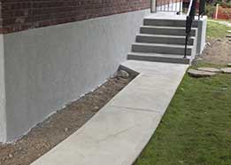 Restoring a sidewalk and concrete balcony